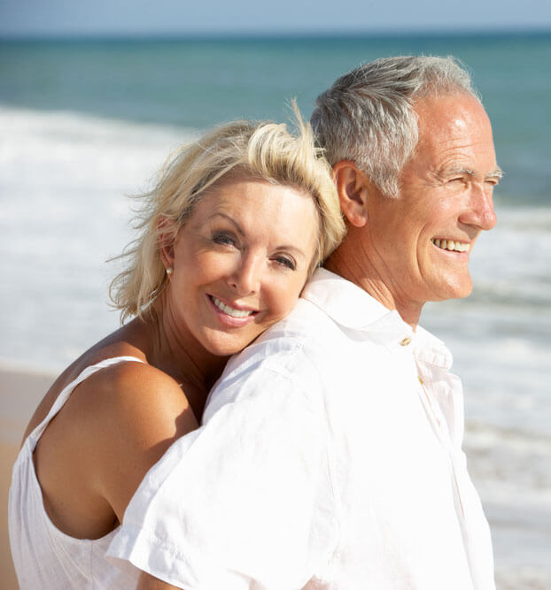 Man and woman embracing on the beach