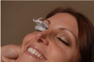 Woman getting lipiflow treatment