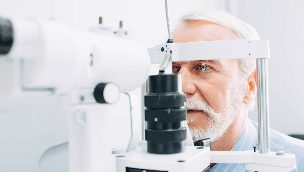 Man getting eye exam from a machine