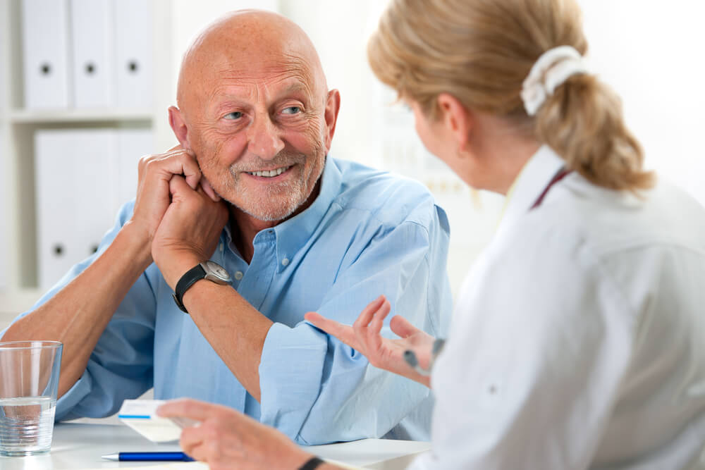 Doctor explaining treatment to patient